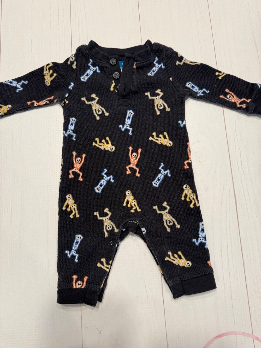 Old Navy Black Knit One-Piece Romper with Colorful skeleton print size 0-3 mo